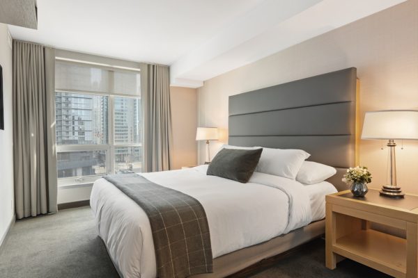 Elegant luxury hotel room with panoramic window views